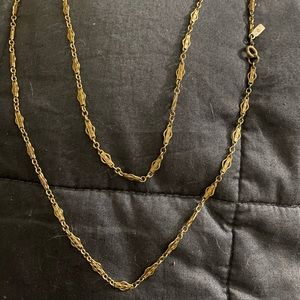 Vintage gold tone stamped Monet long chain